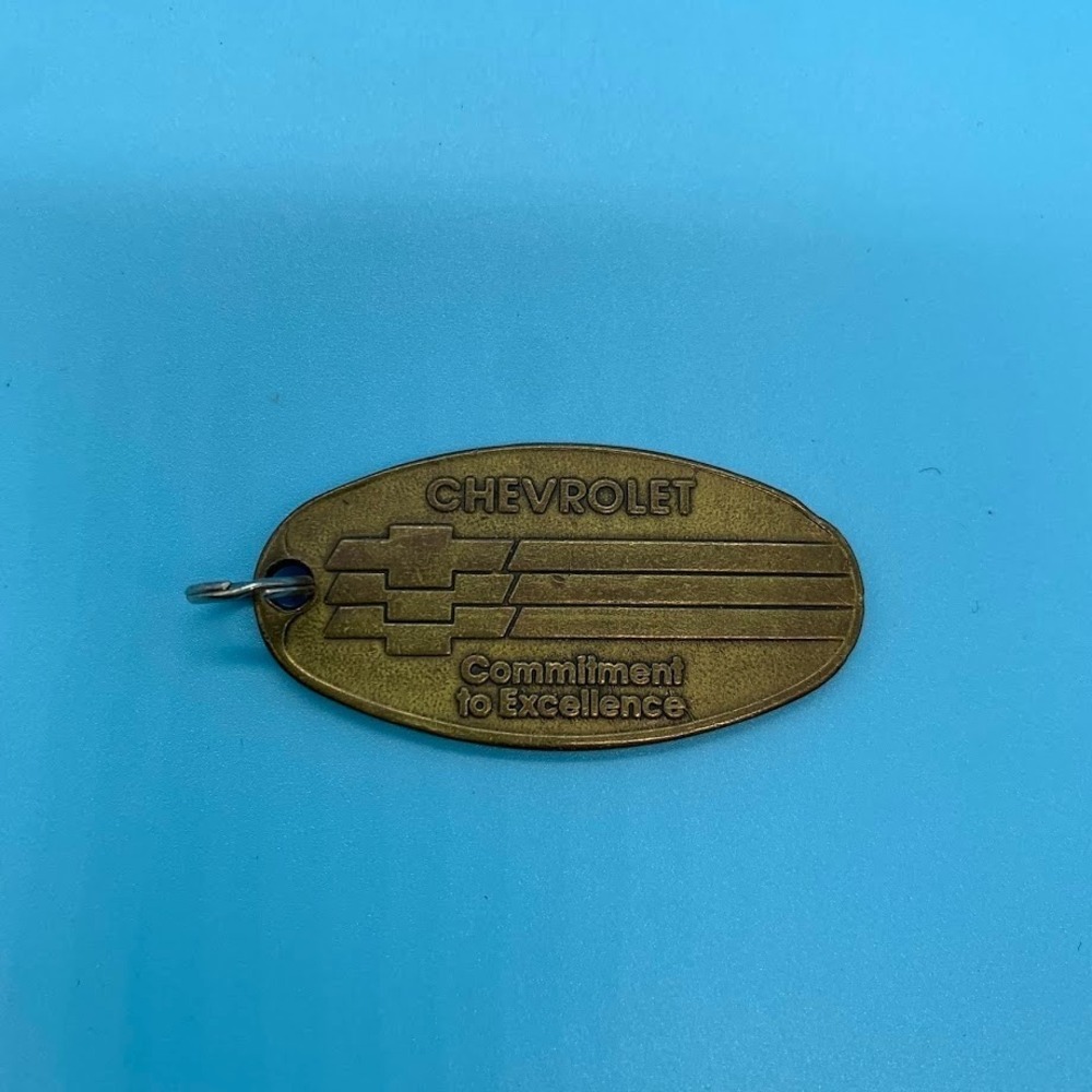 Vintage Chevrolet Commitment to Excellence Metal Keychain Gold Tone Oval Tag